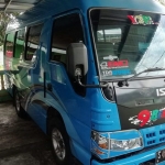 Mobil Isuzu Elf nopol S 7292 A yang raib digondol maling saat diparkir di tepi jalan. (foto: ist)