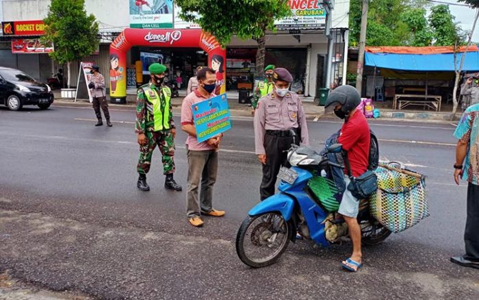 Disiplinkan Prokes, Jajaran Kodim Madiun Bersama Tiga Pilar Lakukan Operasi Yustisi