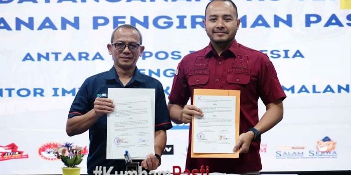 Penandatanganan kerja sama antara Imigrasi Malang dengan PT Pos Indonesia.