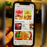 Tampilan menu baru GoFood yang menghadirkan most popular restos dan most loved eats.