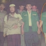 Cak Nur (paling kanan, dilingkari) saat mengawal kedatangan Gus Maksum, Guru Besar Pagar Nusa. foto: istimewa