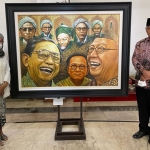 Gus Billy bersama Nabila Dewi Gayatri, pencetus pameran  seni rupa, Senin (13/12/2021).