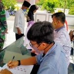 Loket pengambilan BST Covid-19 dari Kemensos di Balai Kecamatan Junrejo.