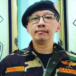 Abu Janda berpakaian seragam Banser. Foto: ist