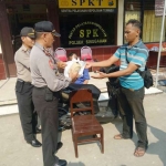 Pelaku saat digelandang petugas di Polres Tuban.