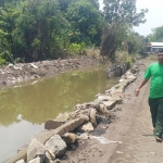 Tanggul yang jebol pasca diguyur hujan di Tebel Cangkringmalang, Beji.