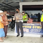 Warung Berkah Nasi Gratis di Pos Induk Satlantas Polres Ngawi.