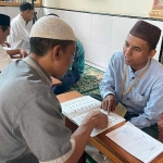 Warga binaan Lapas Probolinggo saat mengikuti belajar baca tulis Alqur’an serta pembelajaran agama.