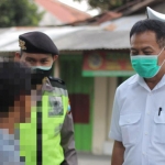 Satu dari dua anak lelaki di bawah umur yang terjaring operasi yustisi. (foto: ist)