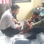 ODGJ bernama M Agus yang diduga pelaku penculikan saat diamankan Polsek Mulyorejo, Kamis (2/2/2023)