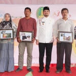 Plt. Wali Kota Pasuruan, Raharto Teno Prasetyo, S.T. membuka kegiatan penyerahan Program NUSP-2 tahun anggaran 2019.