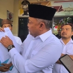 Ketua DPC PKB Bangkalan H Syaifudin saat melaporkan Lukman Edy ke Polres Bangkalan