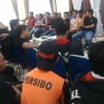 Suasana rapat yang membahas 