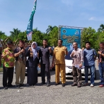 Suasana lomba branding batik untuk sepeda motor dan mobil di area Arek Lancor Kabupaten Pamekasan. (foto: ist)