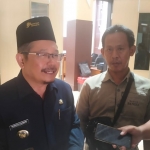 Pj Bupati Pasuruan Andriyanto (kiri) saat memberikan keterangan usai sidang paripurna.