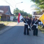 Para pendekar PSHT Kecamatan Senori saat aksi long march.