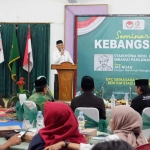 Ketua DPC PKB Bangkalan, Syafiuddin, saat menghadiri seminar kebangsaan yang berlangsung di Pondok Pesantren Syaikhona Kholil.