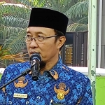 Kepala Kemenag Lamongan, Mukhlisin Mufa.