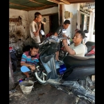 Di tengah pandemi Covid-19, Bengkel Motor Amir tetap bersemangat dalam melayani para pelanggan.