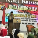 Kapolres Pamekasan saat membuka lomba Tahfidz Quran. foto: ERRY SUGIANTO/ BANGSAONLINE