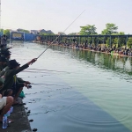 Wisata mancing yang digelar Disbudpar Jatim di Kolam Pancing "Tanggul Rejo" Tambakrejo.