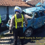 Polisi saat melakukan TKP di lokasi kejadian.