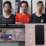 Tersangka beserta barang bukti yang diamankan petugas dari Unit Reskrim Polsek Jogoroto.