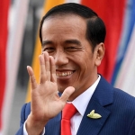 Presiden Joko Widodo melambaikan tangan sesaat sebelum mengikuti Forum G20 di Jerman, 7 Juli 2017 waktu setempat. (Foto: AFP/Patrick Stollarz/Beritasatu.com)