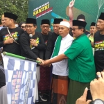 Jalan sehat sarungan di Jember diberangkatkan Menteri Desa PDTT Abdul Halim Iskandar.