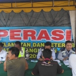 Operasi angkutan umum di terminal Cargo Beji oleh Dishub Provinsi Jatim.