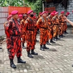 Apel Siaga Koti Mahatidana Pemuda Pancasila yang digelar di Mako Koti kawasan Gunungsari Surabaya, Minggu (6/12/2020).