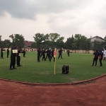 Rekonstruksi 30 adegan tragedi Kanjuruhan, Malang, yang digelar di lapangan Mapolda Jatim.