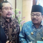 Pakde Karwo bersama Ketua F-PG DPRD Jatim, Sahat Tua Simanjuntak usai paripurna di DPRD Jatim.