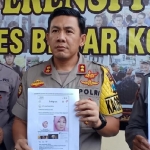 Polisi menunjukkan penghinaan simbol negara di aku Facebook Aida Konveksi.