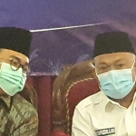 Anggota DPR RI Komisi V, H. Syafiuddin (kanan) bersama Bupati Pamekasan, Badrut Tamam saat menghadiri Sosialisasi UU Nomer 13 tahun 2020 oleh Mendes PDT dan Transmigrasi, Dr. (HC) Drs. H. Abdul Halim Iskandar, Sabtu (28/11/2020).