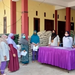 Penyaluran bansos beras untuk KPM di Kota Batu.