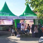 Acara BPJS Ketenagakerjaan yang berlangsung di Pasar Bandar, Kota Kediri.