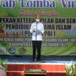 Bupati Yuhronur saat menyampaikan sambutan dalam pembukaan Sab’ah Lomba Virtual.