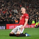 Gelandang Manchester United, Scott McTominay saat tampil di suatu laga. 