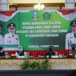 Rapat Koordinasi Tim Desk Pilkada Provinsi Jawa Timur di Pendopo Delta Wibawa, Kabupaten Sidoarjo, Senin (7/12/2020) malam.