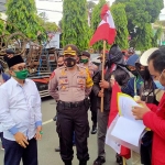 Jimat Trenggalek saat aksi turun ke jalan menolak UU Cipta Kerja.