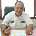 Agustin H. Sinaga, Kepala Disbudpar Gresik.