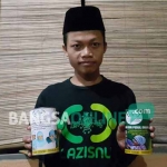 Dua macam kaleng koin surga yang diluncurkan Lazisnu Kabupaten Jombang.
foto: ROMZA/ BANGSAONLINE