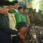 Kegiatan pelantikan anggota Banser Mojokerto. foto: SOFFAN/ BANGSAONLINE