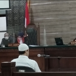 Terdakwa Ferry Irawan saat mengikuti sidang dakwaan.