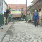 Akses masuk menuju SMPN 2 Tanggulangin Sidoarjo yang telah selesai ditinggikan. (foto: ist)