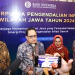 Pj Gubernur Jatim, Adhy Karyono, saat menghadiri Rakorpusda BI 2024 di Malang.