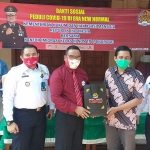 Kanwil Kemenkumham Jatim bersama Kantor Imigrasi Kelas III Non-TPI Ponorogo saat memberikan bantuan APD di Gereja Katolik Santa Maria Ponorogo. (foto: ist).