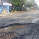 Salah satu titik jalan yang belum ada perbaikan.