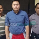 Tersangka Arden Gabriel Sudarto saat penahanan di Mapolrestabes Surabaya.